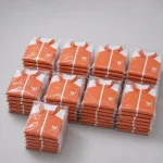 Áo khoác gió đồng phục cam phối trắng Thành Tín - ảnh đóng gói theo lô