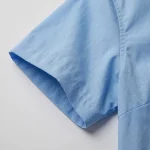Áo Sơ Mi Đồng Phục Xanh Nhạt Ngắn Tay Logo Đỏ - can tay ao