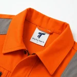 Đồng phục bảo hộ cam phản quang Thành Tín - ảnh cận cổ áo và logo