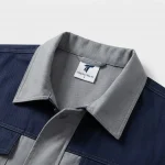 Đồng phục bảo hộ xám phối navy Thành Tín - ảnh cận cổ áo và logo
