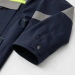 Đồng phục bảo hộ xanh navy phối phản quang vàng Thành Tín - ảnh cận tay áo, túi và chi tiết phản quang