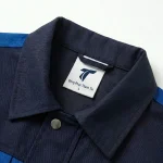 Đồng phục bảo hộ xanh navy phối xanh dương Thành Tín - ảnh cận cổ áo và logo